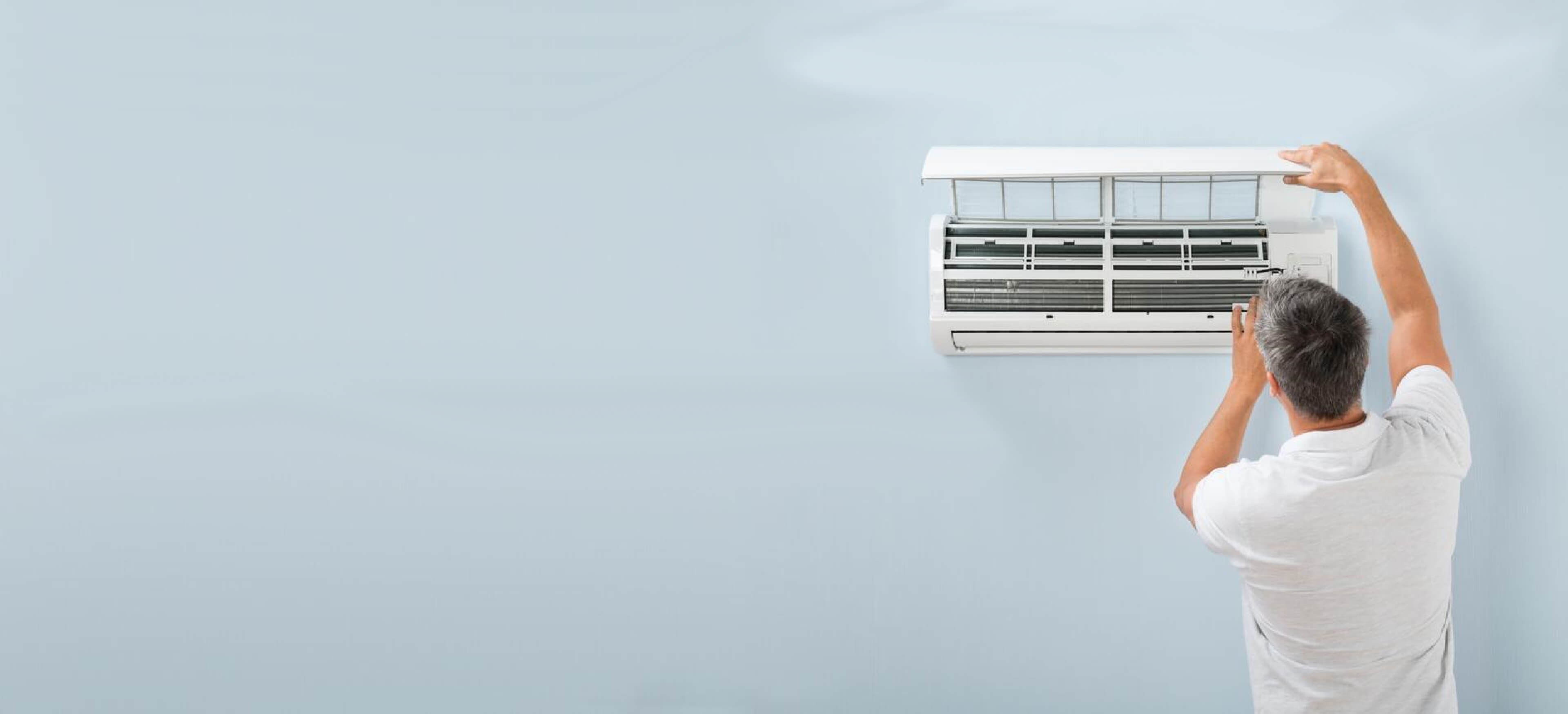 Air conditioning engineering fitting a wall mounted unit